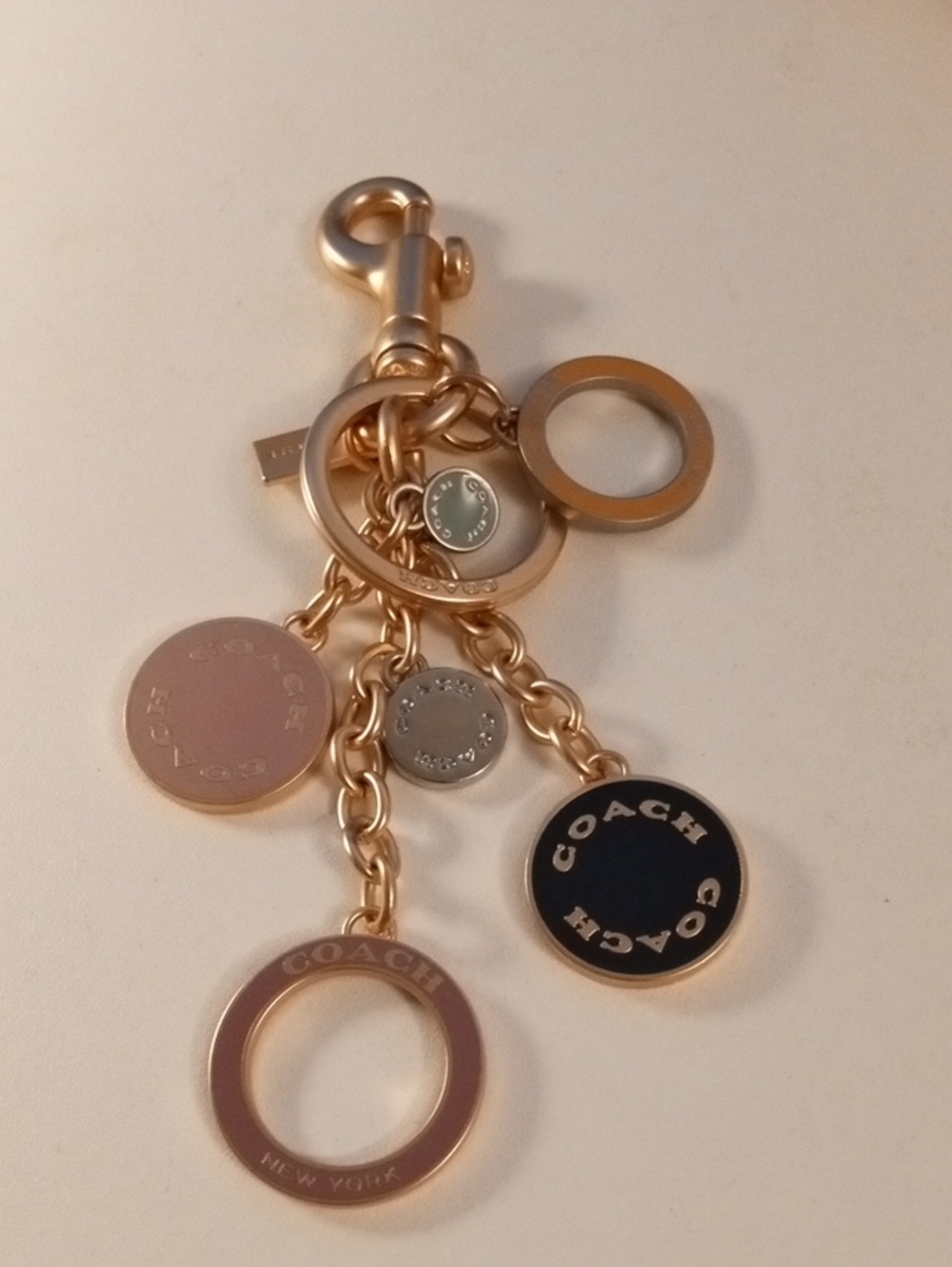 COACH Gold-Tone Logo Charm Keyring with Pink, Black & Silver Accents